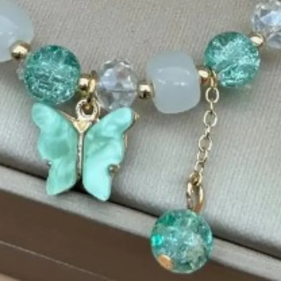 Vibrant Butterfly Charm Bracelet - Colorful Glass Beads, Dangling Tassel Accent - Picture 4 of 5